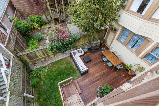 Property Thumbnail: Aerial view of the outdoor living space and yard at 1330 Shrader Street
