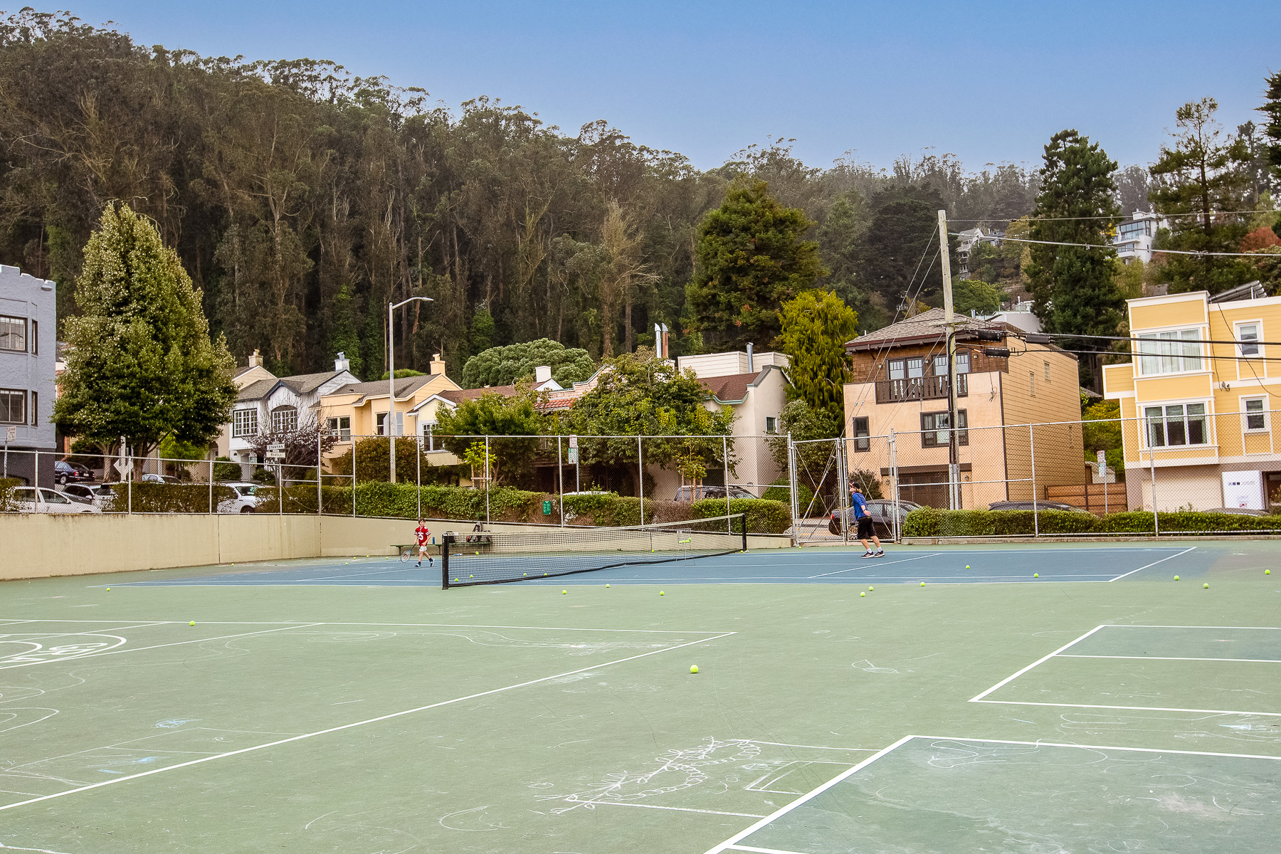 Property Photo: View of the tennis courts at nearby Grattan Playground