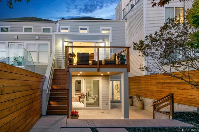 Property Thumbnail: Twilight rear view of 1235 5th Ave, showing two levels of outdoor living