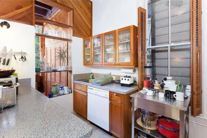 Property Thumbnail: View of the kitchen, showing wood cabinets