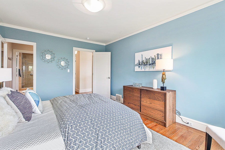 Property Photo: View of a bedroom with wood floors