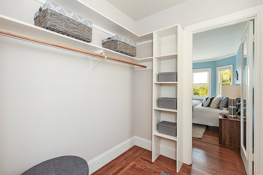 Property Photo: View of a walk-in closet with storage space