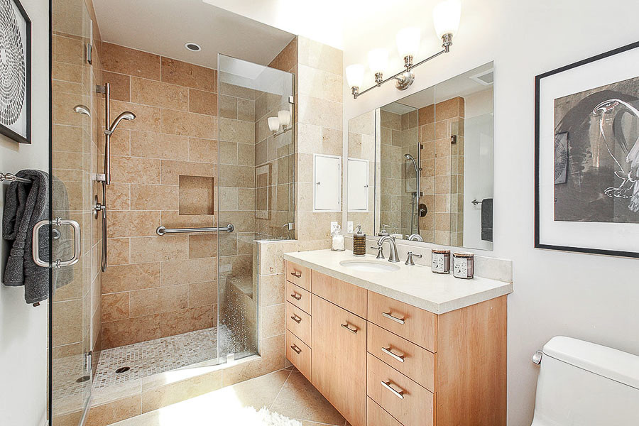 Property Photo: View of a large bathroom with glass-front shower