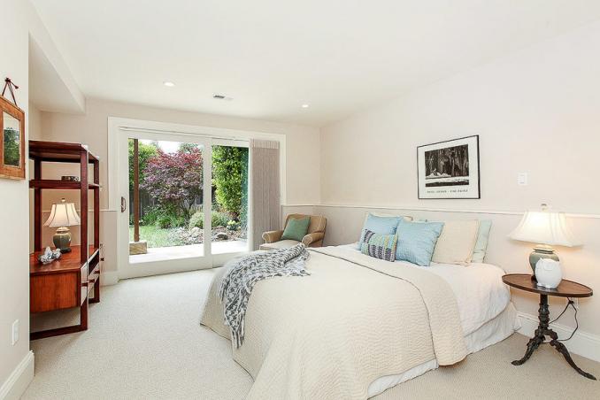 Property Thumbnail: View of another bedroom with a large exterior door to the back yard
