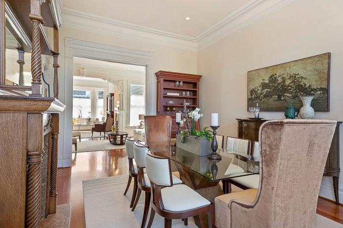 Property Thumbnail: View of the formal dining room, featuring crown moulding and wood floors