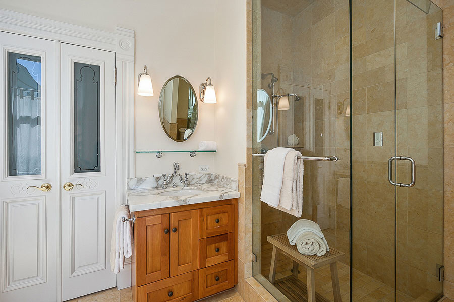 Property Photo: View of a bathroom with glass-front shower