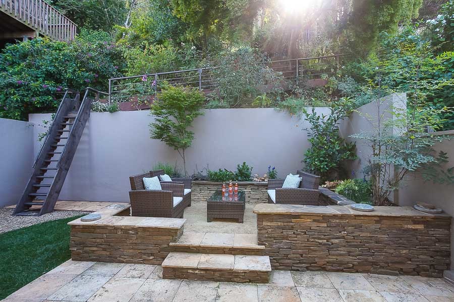 Property Photo: View of the outdoor living space, featuring a stone patio
