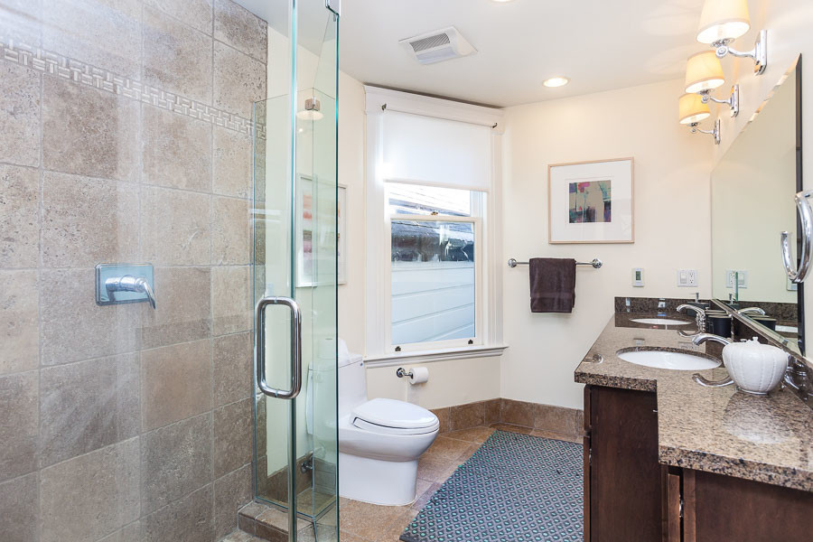 Property Photo: View of a bathroom with glass front shower