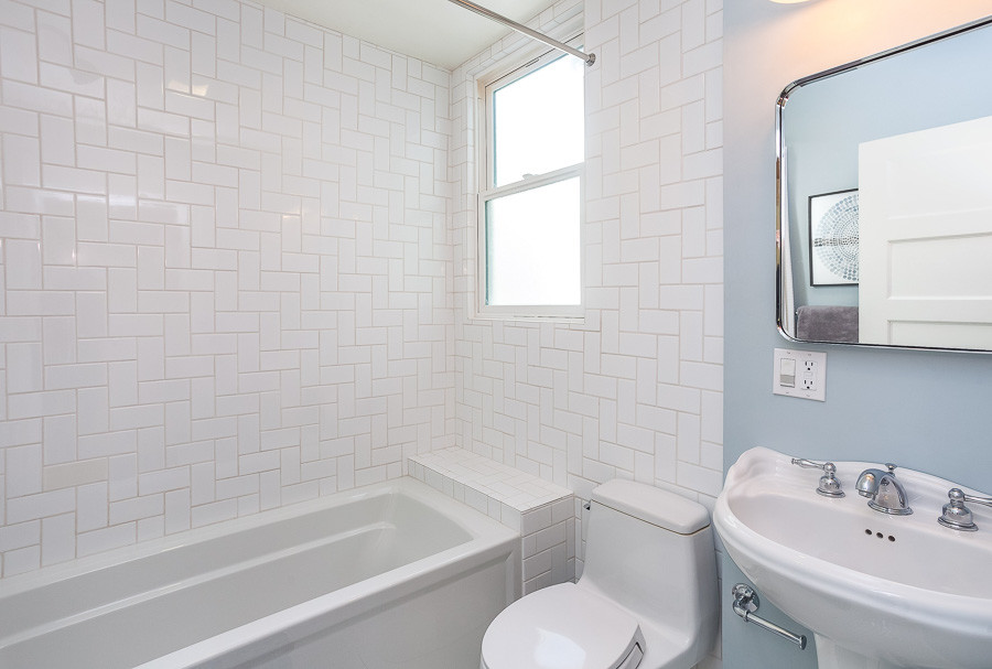Property Photo: Bathroom with white tile