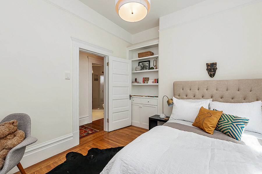 Property Photo: View of another bedroom with wood floors