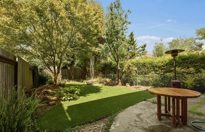 Property Photo: View of the out door area at 134 Grattan Street, featuring a landscaped yard