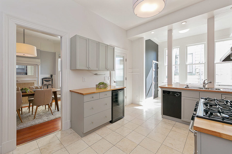 Property Photo: View of the kitchen with tile floor and plenty of natural light