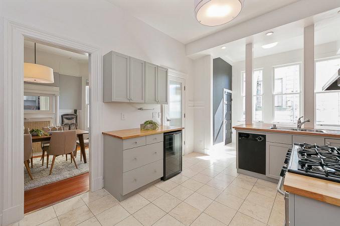 Property Thumbnail: View of the kitchen with tile floor and plenty of natural light