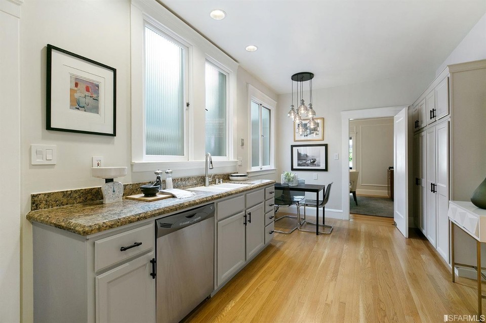 Property Photo: Kitchen with wood floors