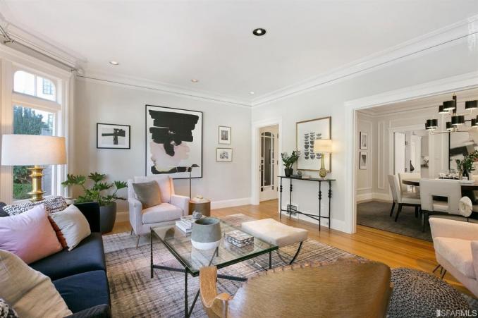 Property Thumbnail: Living room with white crown moulding and plenty of natural light