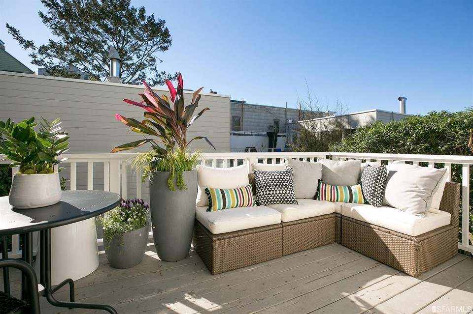 Property Photo: View of a deck and outdoor living area