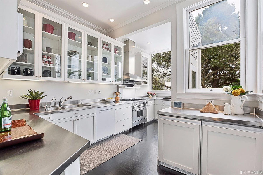 Property Photo: Kitchen with glass doors on the upper cabinets