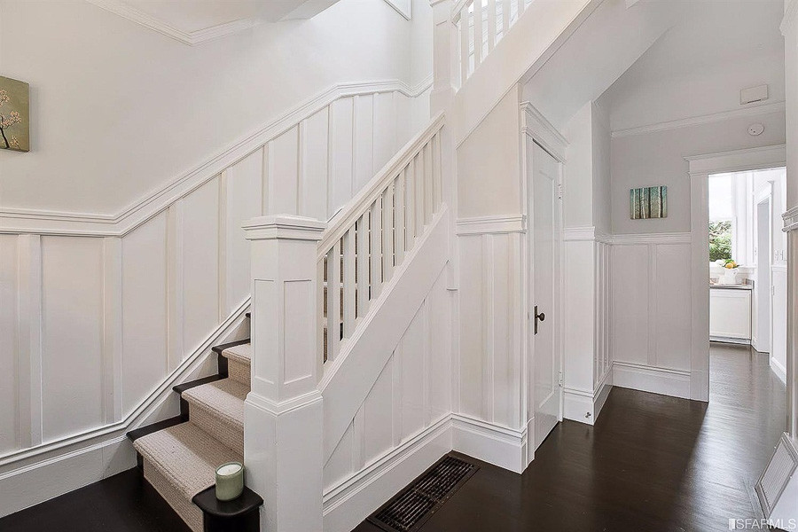 Property Photo: View of the staircase leading up
