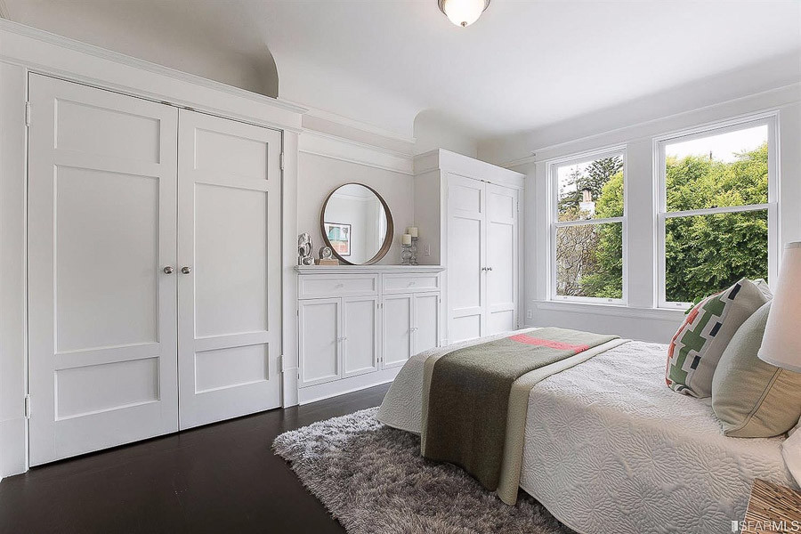 Property Photo: View of a large bedroom with built-in closets