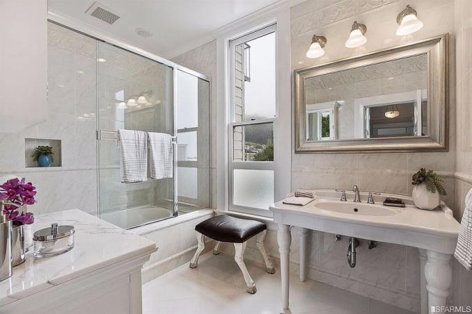 Property Thumbnail: View of a bathroom with large sink and glass-front shower