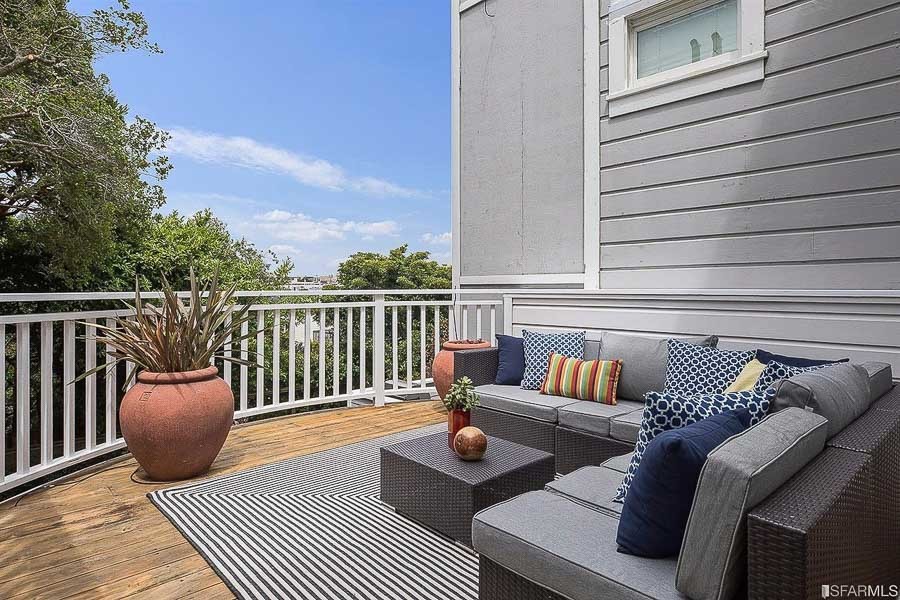 Property Photo: Deck with outdoor living area