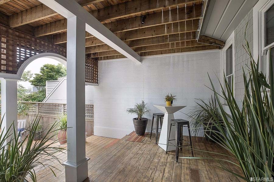 Property Photo: View of a lower patio area with quaint dining space 