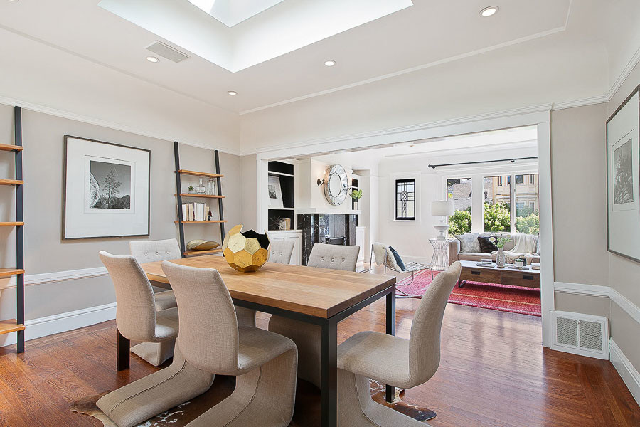 Property Photo: Dining area with a skylight and wood floors