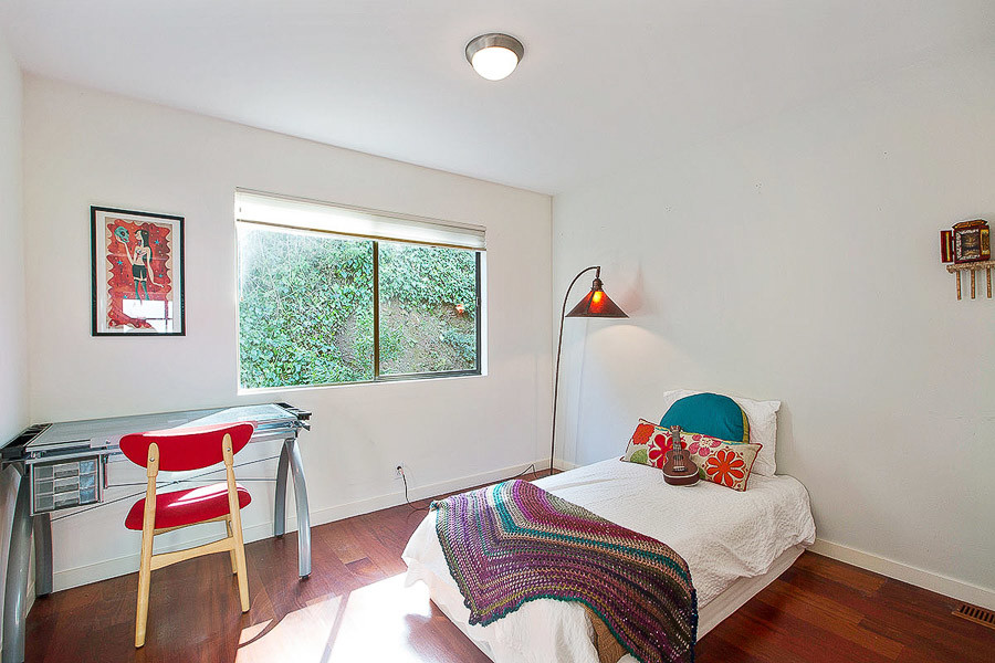 Property Photo: Bedroom with a large window