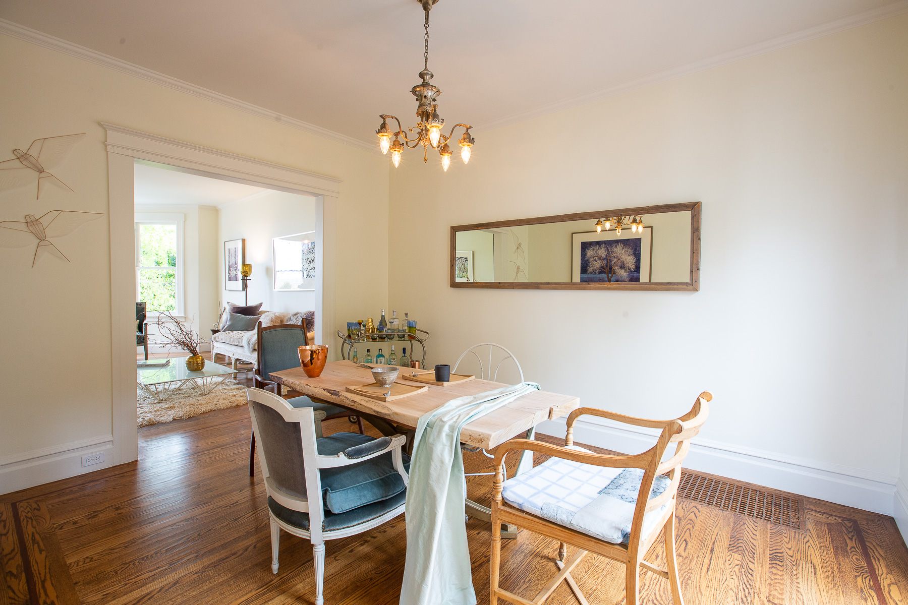 Property Photo: View of the dining room with rustic wood floors