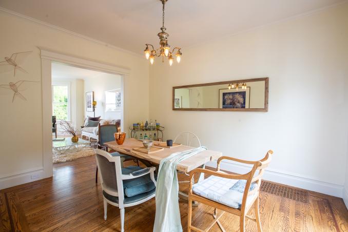 Property Thumbnail: View of the dining room with rustic wood floors