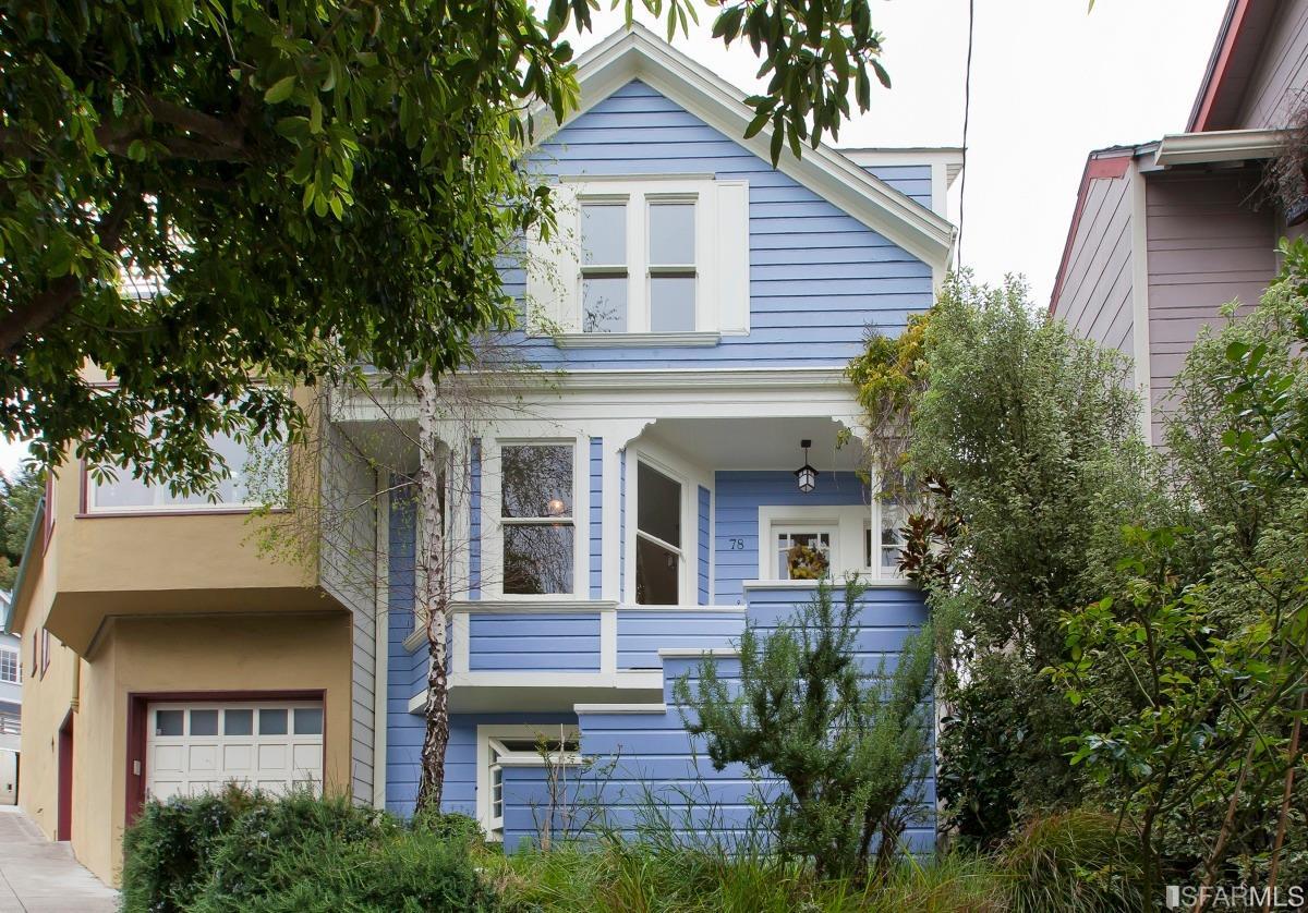 Property Photo: Font exterior view of 78 Harper Street, featuring a blue facade