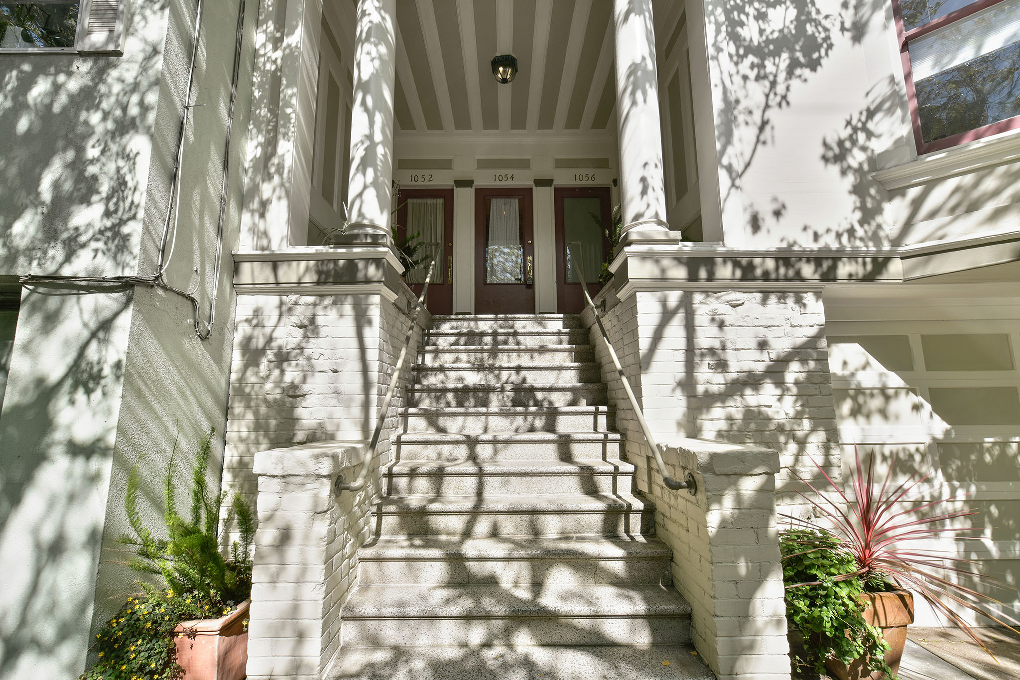 Property Photo: View of the front exterior steps leading up to 1052 Cole Street