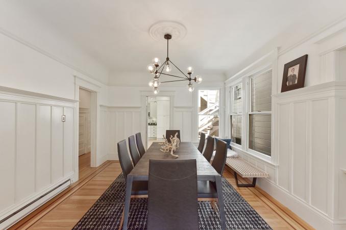 Property Thumbnail: View of the formal dining room with white wood wainscoting